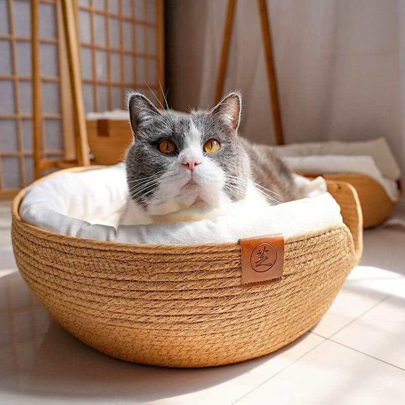 Bamboo Pet Nest for dogs and cats, handwoven, cozy cushion, breathable, stylish pet bed.