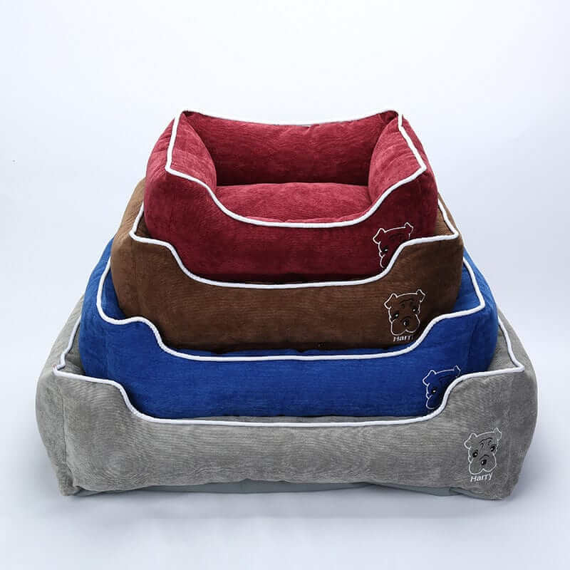 Stack of Candy Comfort Fleece Dog Beds in various colors, perfect for small to large dogs, featuring plush fleece material.