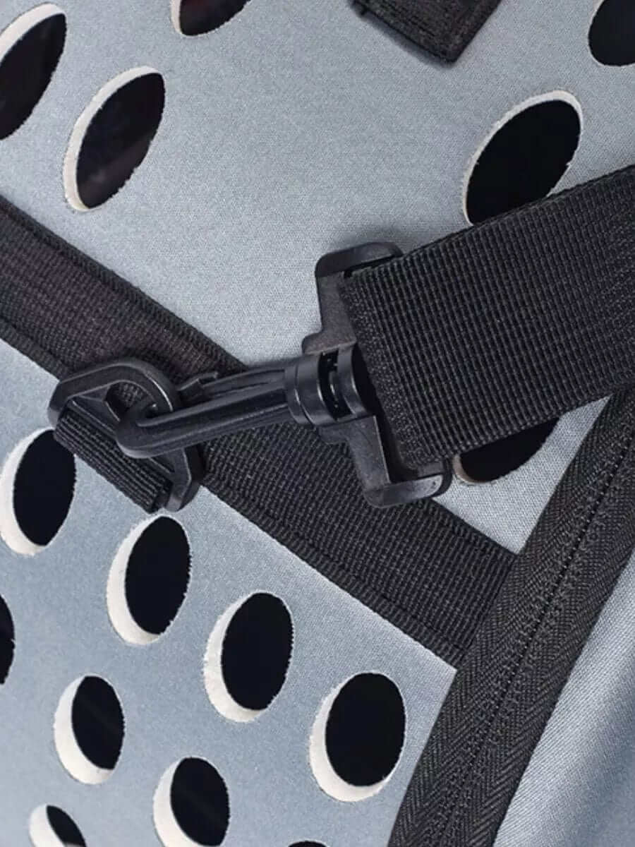 Close-up of the zipper and buckle on the Compact Travel Pet Carrier, showcasing its durable design for dogs and cats.