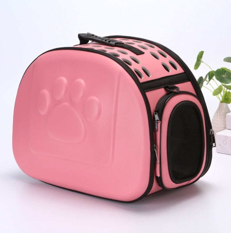 Compact Travel Pet Carrier - Lightweight and foldable pet carrier for dogs and cats with stylish pink design.