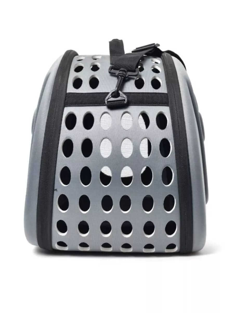 Compact Travel Pet Carrier featuring breathable mesh design for dogs and cats, stylish and portable for pet owners.