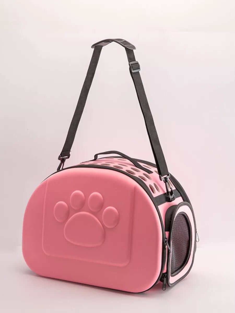 Compact Travel Pet Carrier, lightweight carrier for small dogs and cats, stylish design with paw print detail.
