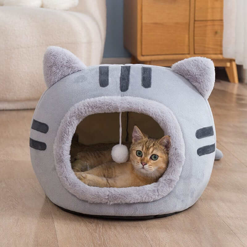 CozyCave Winter Cat Bed for cats and small dogs, features soft insulated interior and secure tent-like structure.