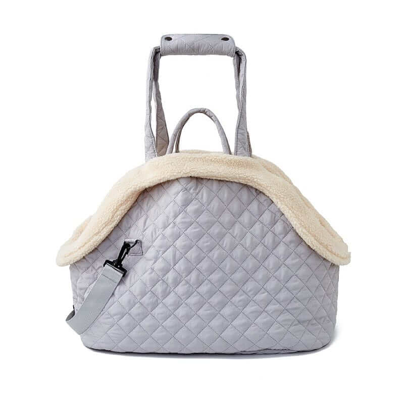 Elegant Quilted Pet Carrier - Stylish grey quilted pet carrier with plush interior for dogs and cats.