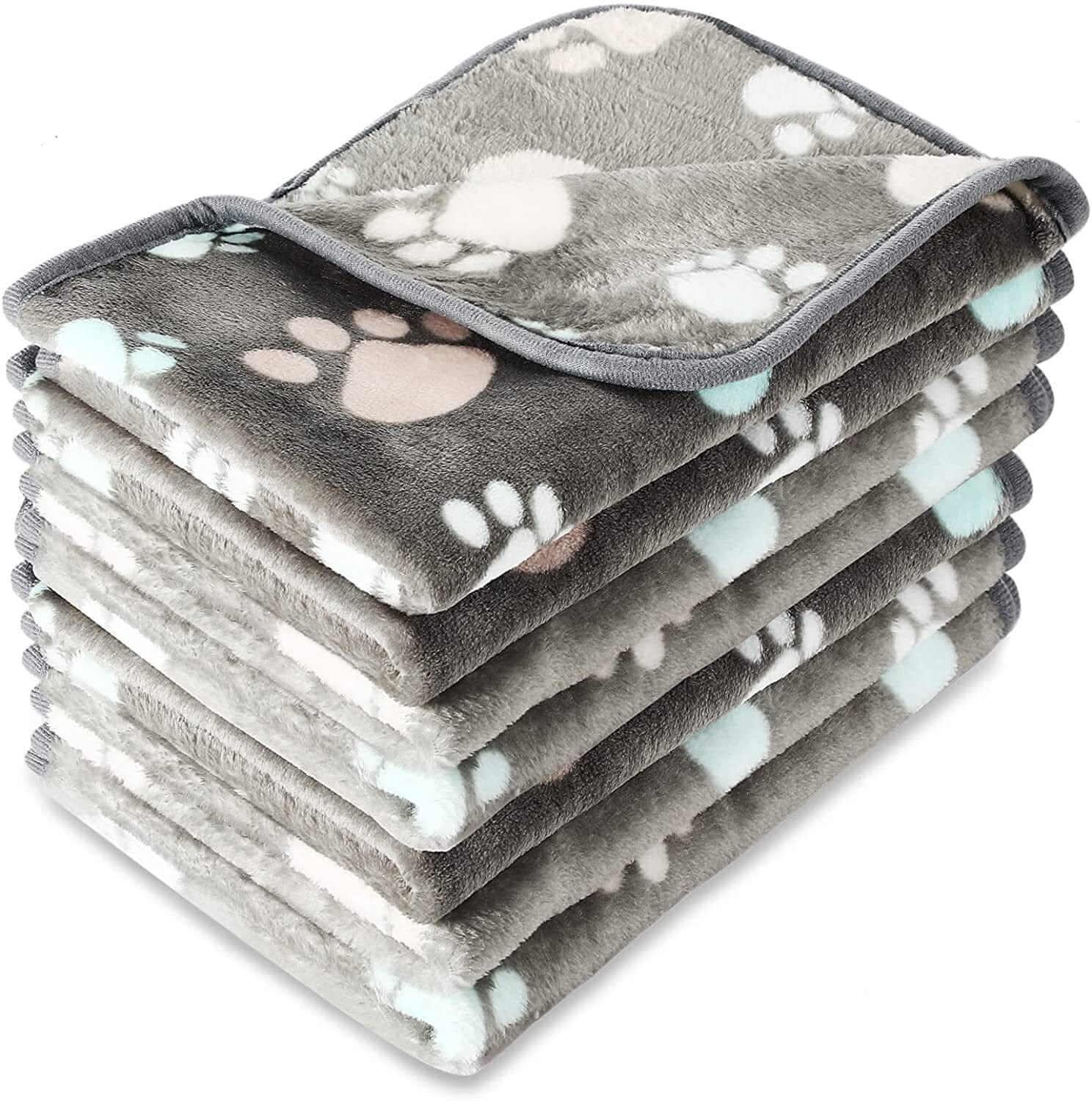 Fluffy Pet Blanket stacked layers showing soft materials and paw print patterns, perfect for dogs and cats.