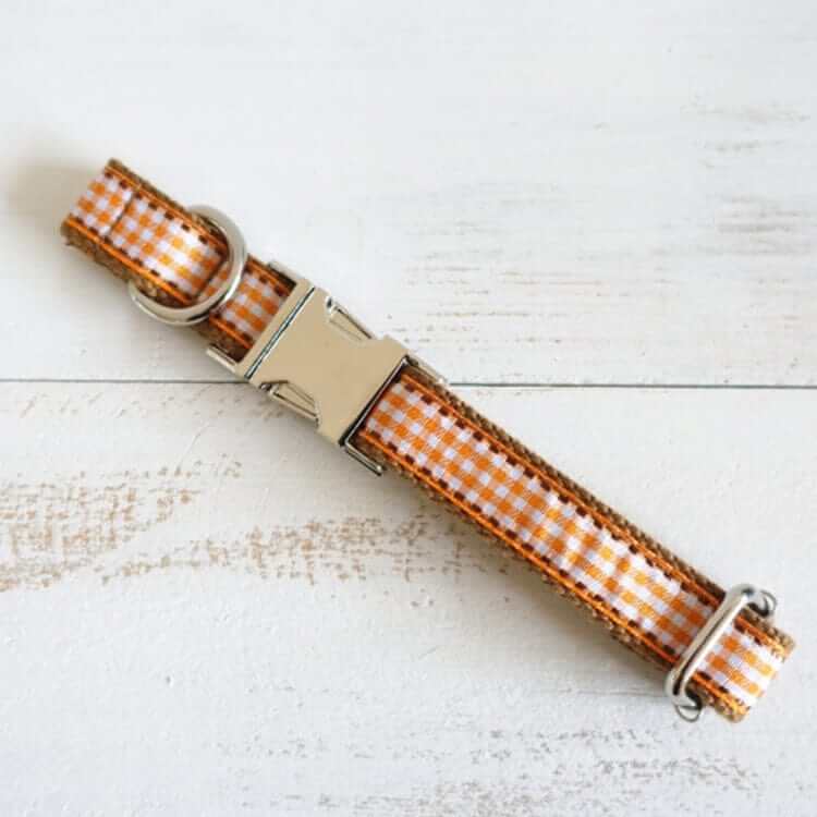 Heritage Plaid Dog Collar, soft fabric collar for dogs and cats, features an elegant brown check pattern.