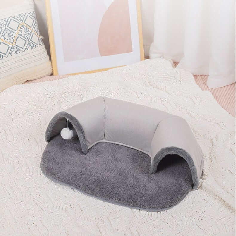 Interactive Cat Tunnel Bed featuring a cozy, plush design for play and rest, ideal for Dogs & Cats brand.