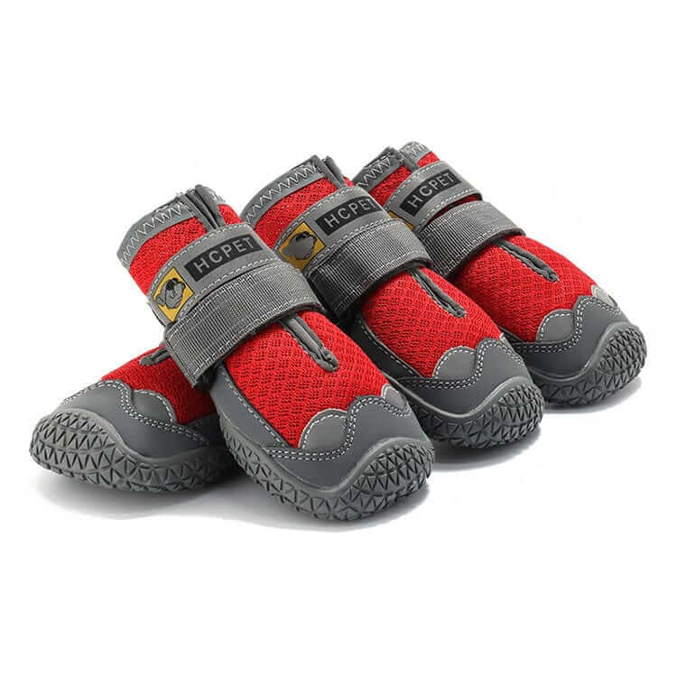 PawGuard Dog Boots set featuring red waterproof materials, anti-slip soles, and reflective strips for dogs and cats.