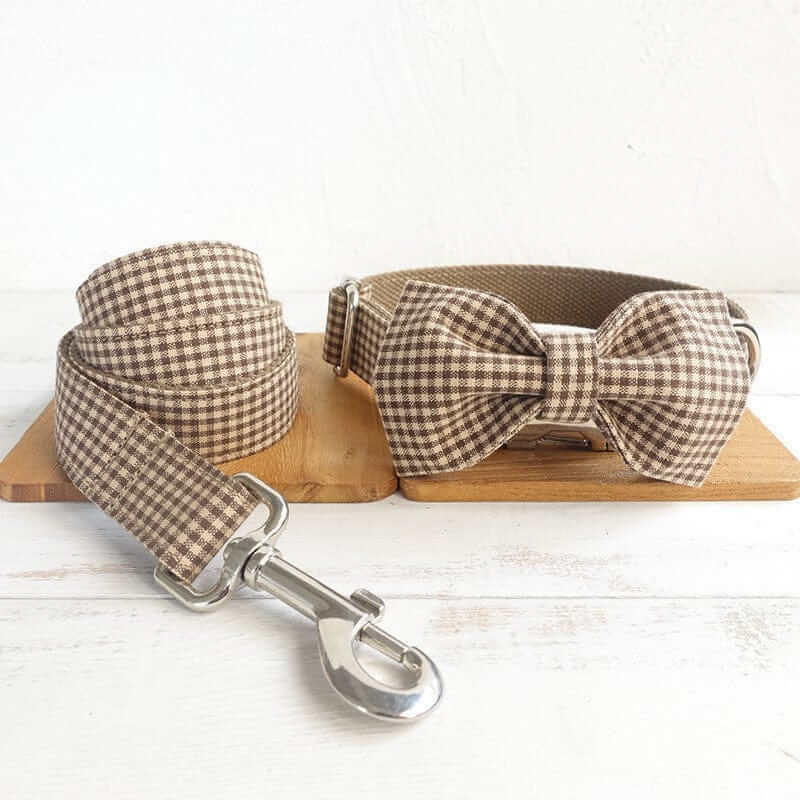 Plaid Elegance Dog Collar & Leash Set featuring a stylish bowtie collar and matching leash for dogs of all sizes.
