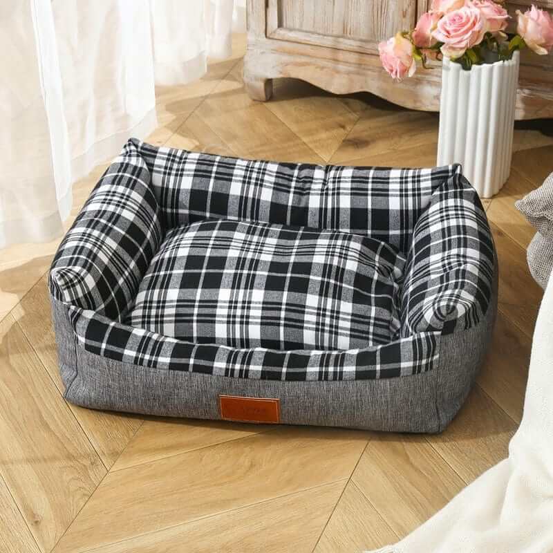 PlaidPaws Pet Bed Lounger, cozy pet bed for Dogs & Cats, features retro plaid design, breathable, washable materials.
