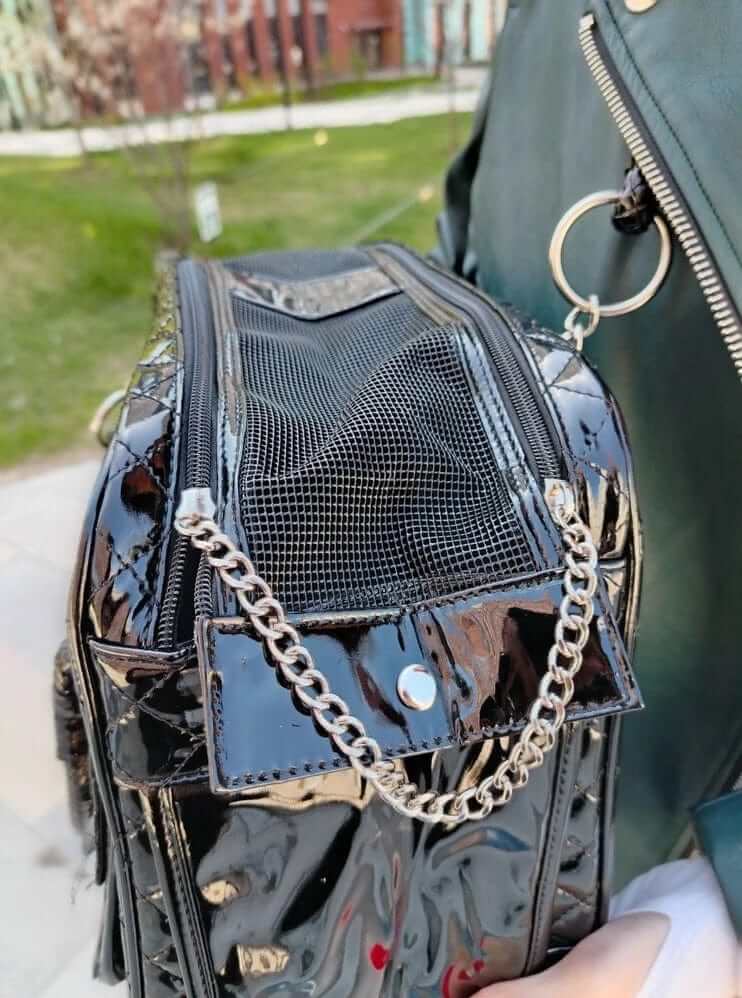 Sleek Leather Pet Carrier showing premium leather design and mesh top for pet comfort and ventilation.