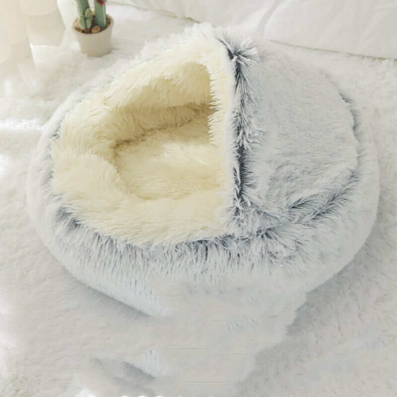 SnuggleNest Plush Cave Cat Bed, cozy plush pet bed designed for dogs and cats, soft and warm hideaway.