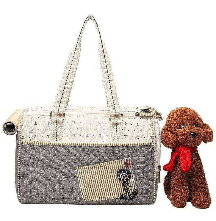 Anchor Pet Canvas Carrier Bag with side entrance, removable pad for dogs & cats, durable material, adjustable features.