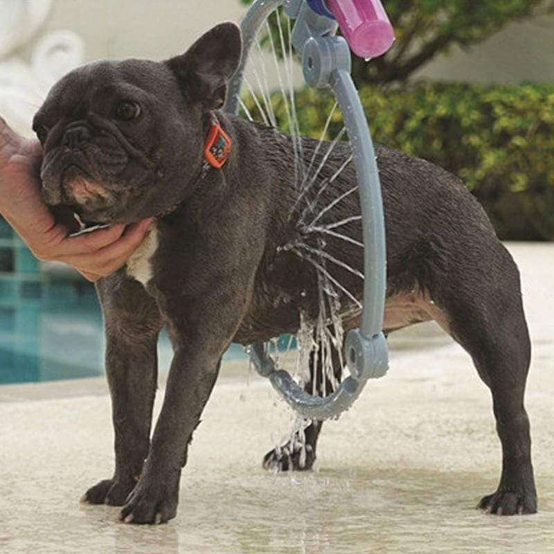 Foldable cleaning hose in use on a dog, showcasing its features for easy washing and rinsing.