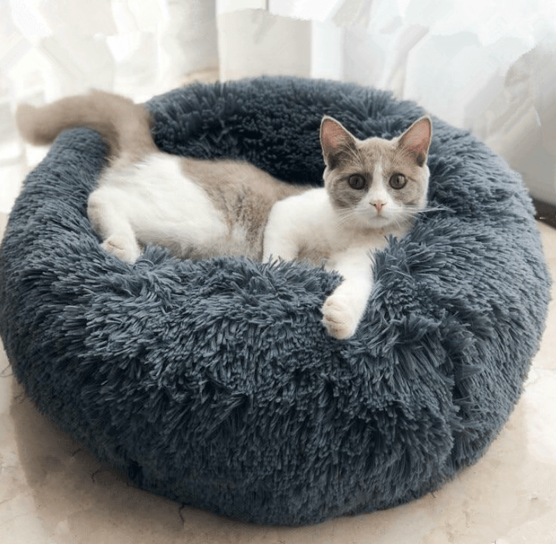 Ultra Soft Pet Bed for Dogs & Cats, featuring high-quality plush fur and comfort for pets.