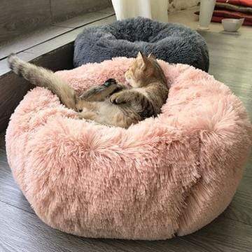 Ultra Soft Pet Bed for dogs & cats, plush comfort, high-quality material, perfect for keeping pets warm.