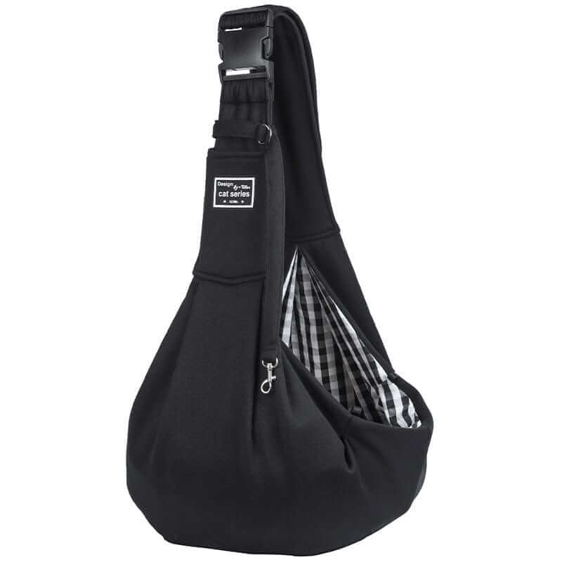 Adjustable Dog Sling Carrier, black pet carrier with adjustable strap, comfy interior for small dogs and cats.