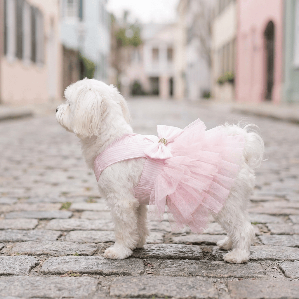 Bowknot Ruffle Sleeveless Dress for dogs, featuring a pink ruffle skirt and bow, by Dogs & Cats brand.
