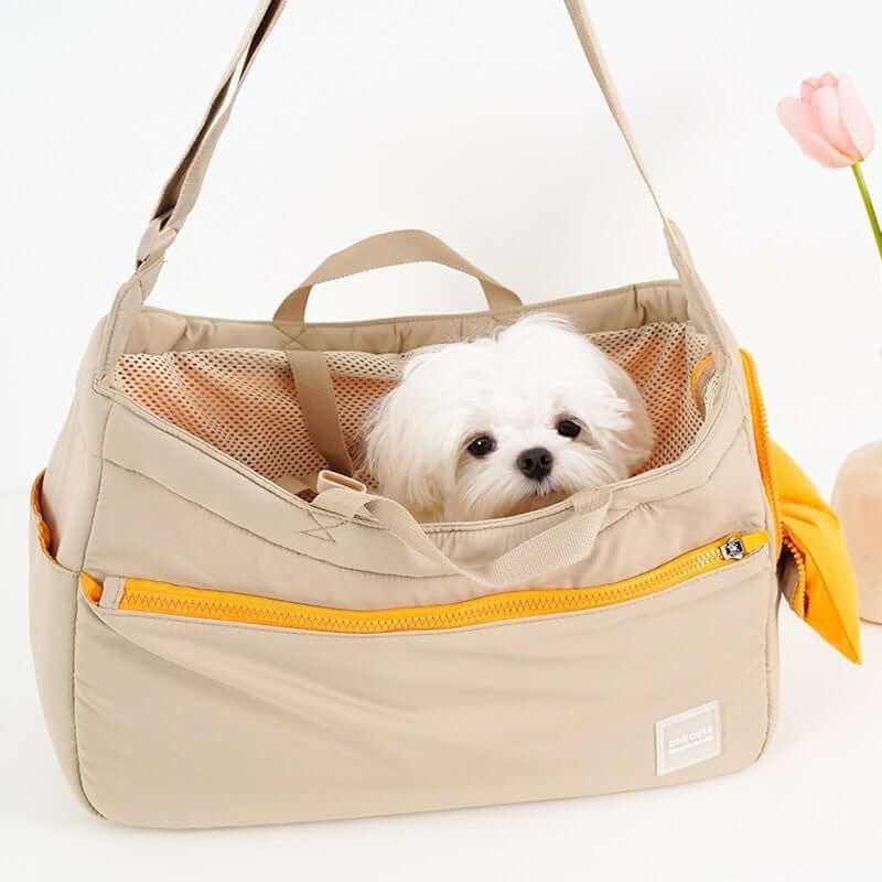 BreezeVent Pet Travel Bag featuring breathable mesh, ideal for dogs and cats, stylish hands-free design for pet travel.