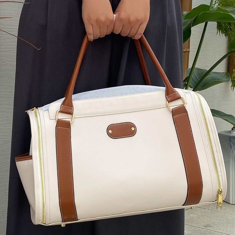 Chic Leather Pet Bag - luxury pet carrier for dogs & cats with waterproof leather, stylish design and practical features.