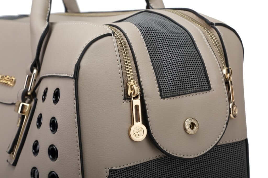 Comfort Pet Travel Tote stylish pet carrier with breathable design and secure zippers for dogs and cats.