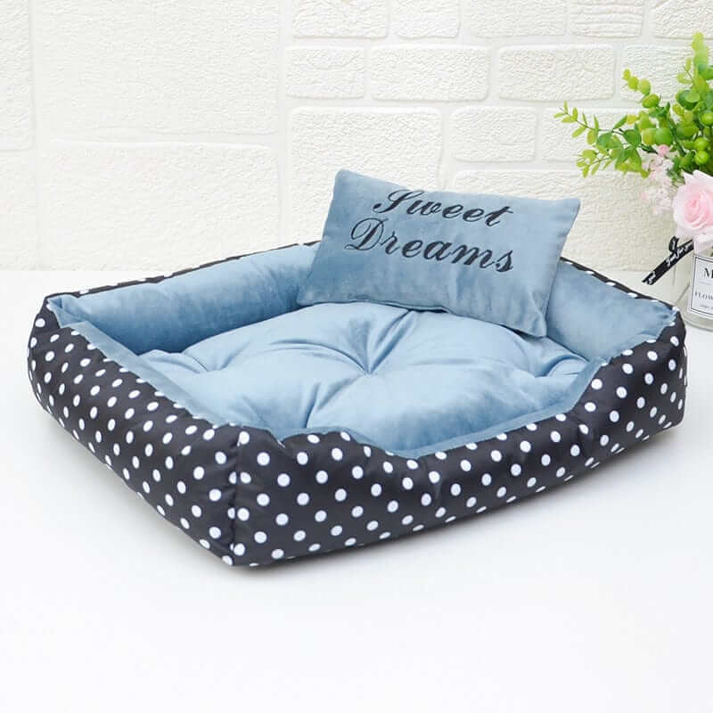 ComfortNest Dog Bed in stylish polka-dot design, featuring breathable materials and soft padding for year-round comfort.