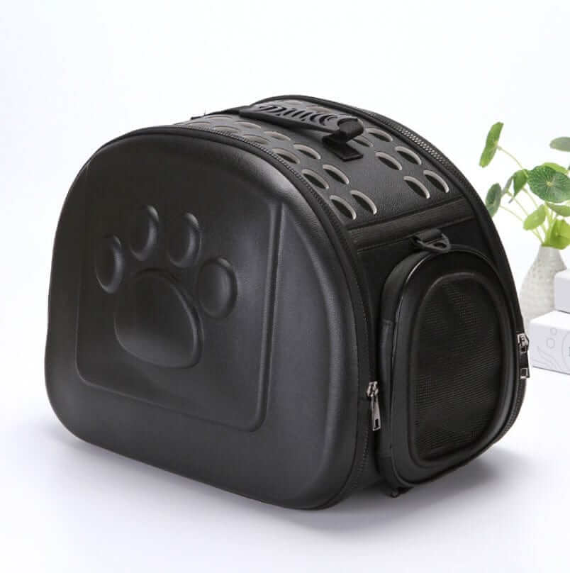 Compact Travel Pet Carrier, lightweight carrier for dogs & cats, stylish portable design with a paw print.