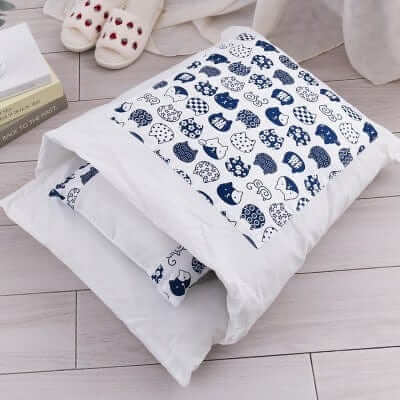 CozyNest Washable Cat Bed with plush design, featuring cute cat patterns for ultimate comfort and warmth.