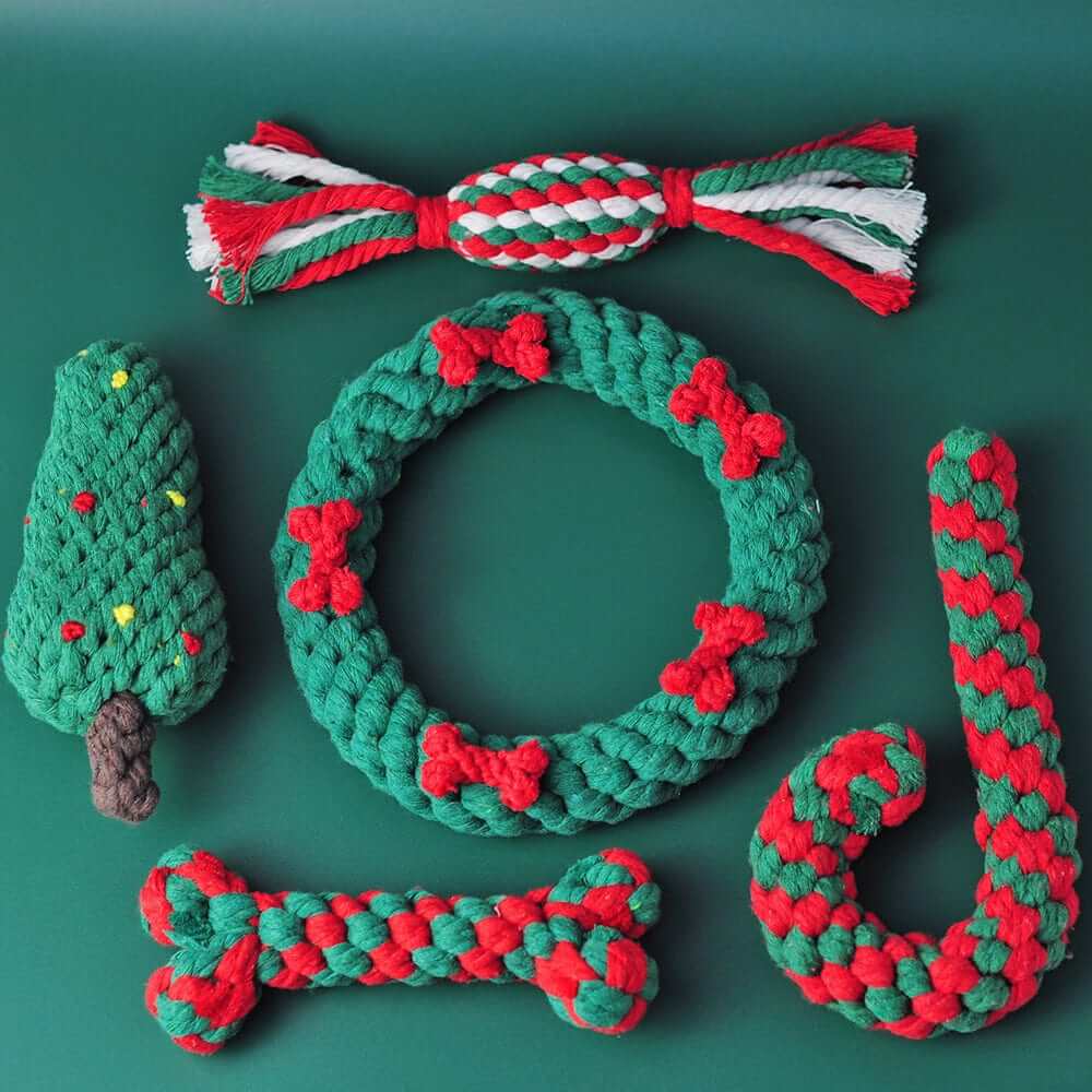 Festive Dog Tooth Cleaning Toys featuring fun shapes like a Christmas tree, wreath, candy cane, bone, and rope, designed for dogs.