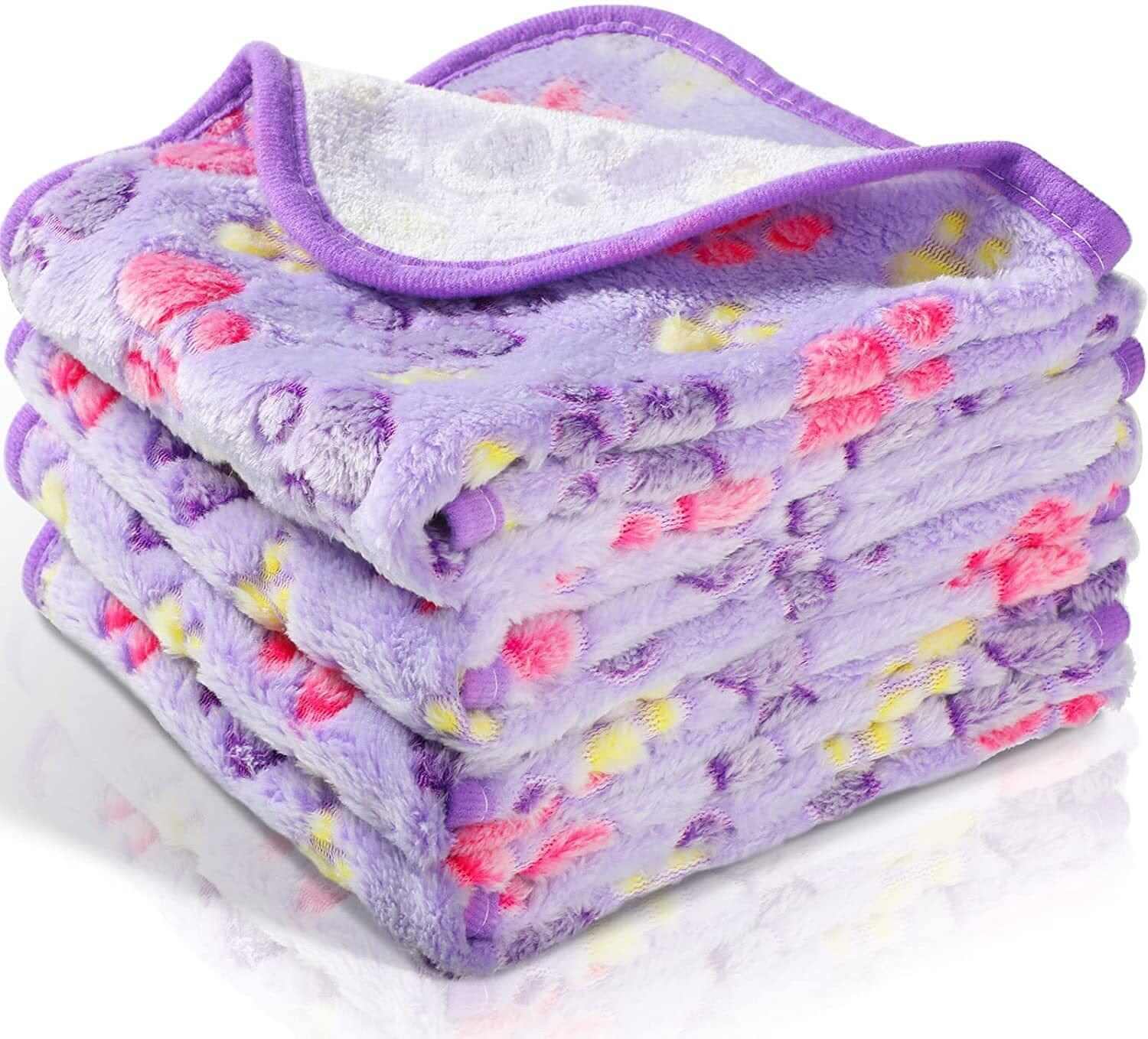 Fluffy Pet Blanket, soft and fluffy pet blanket for dogs & cats, featuring cute cartoon patterns in purple.