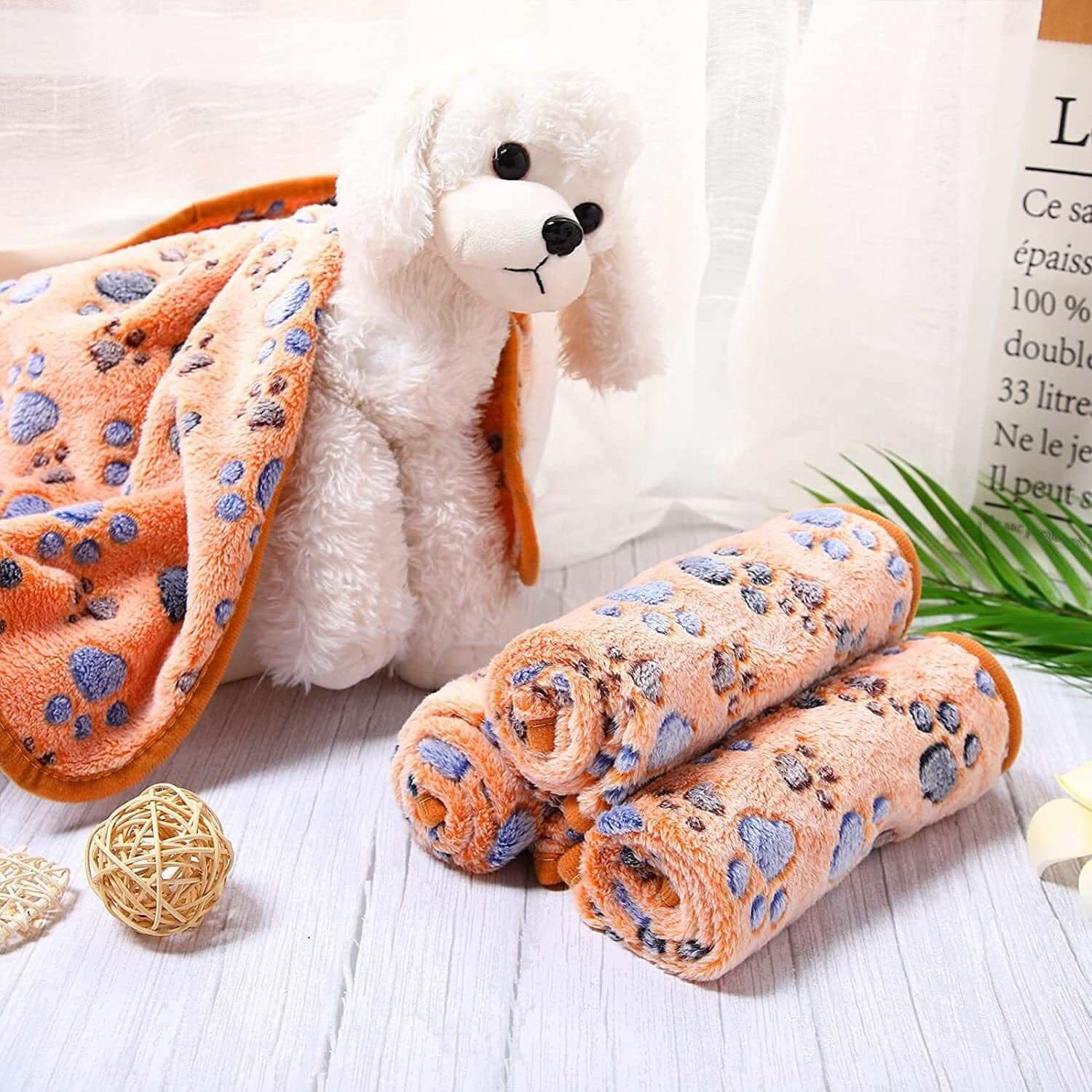 Fluffy Pet Blanket with cartoon patterns and plush dog toy, perfect for cozy comfort for Dogs & Cats.