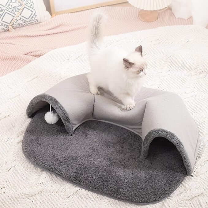 Interactive Cat Tunnel Bed featuring cozy, self-warming design with playful tunnel and plush mat for cats.