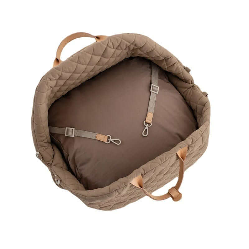 Multifunctional Pet Travel Bag interior with quilted design, safety straps, waterproof material for Dogs & Cats.