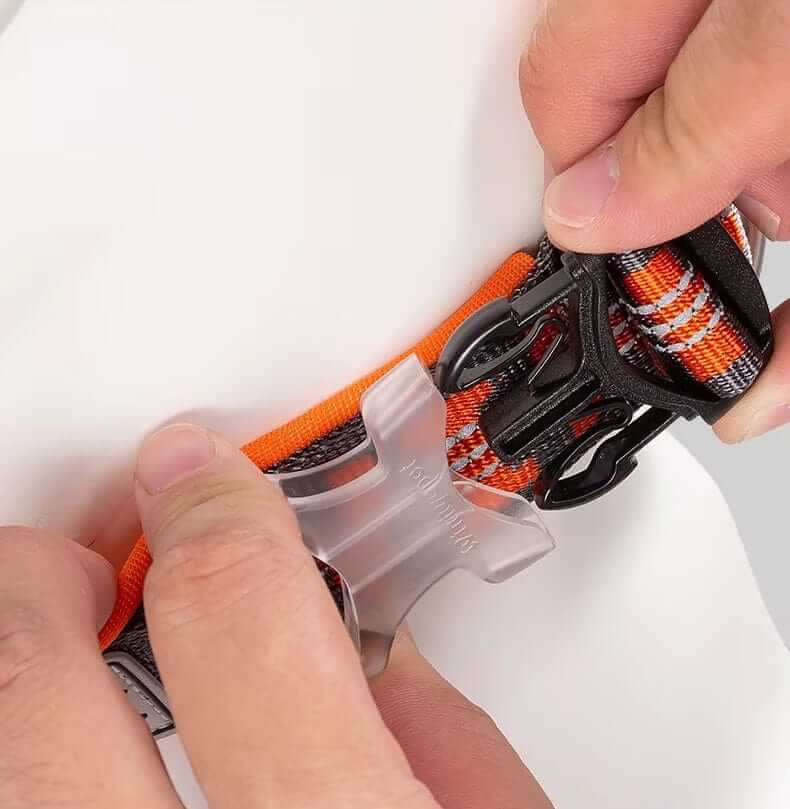 NightSafe Neoprene Dog Collar being adjusted with secure clip system for optimal fit and comfort.