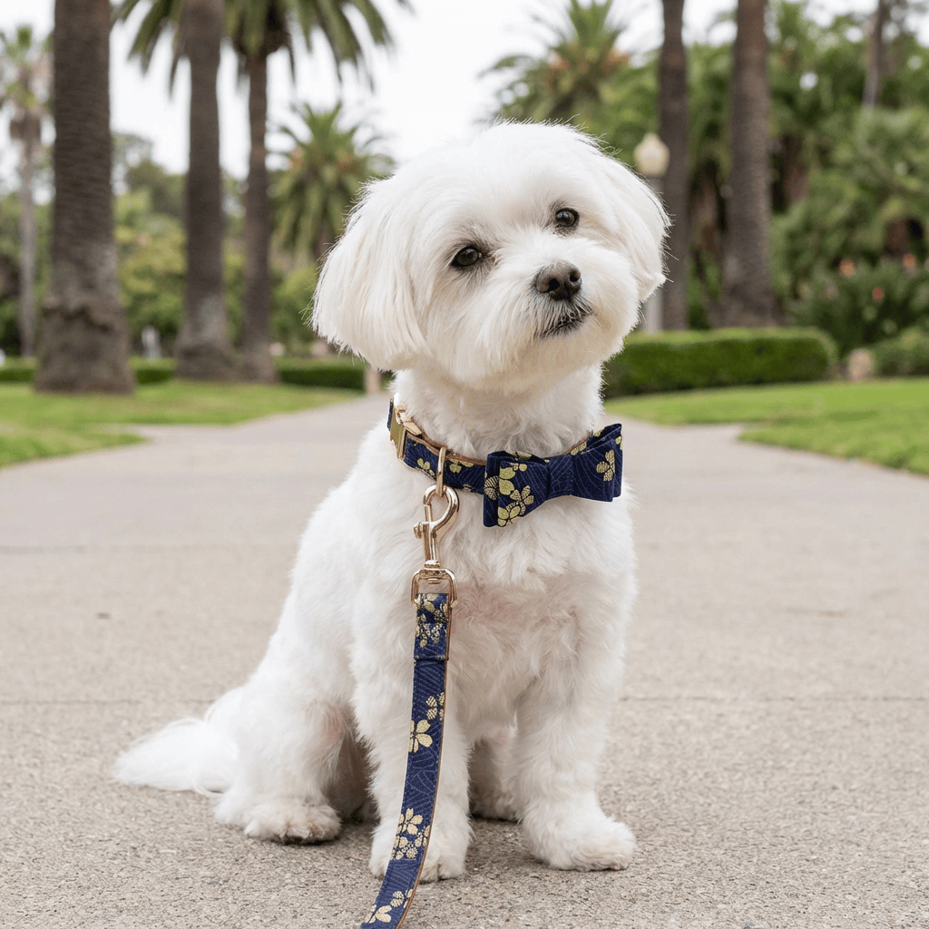Pet Collar Bandanna for dogs, featuring a floral pattern and bowknot design, perfect for stylish daily walks.