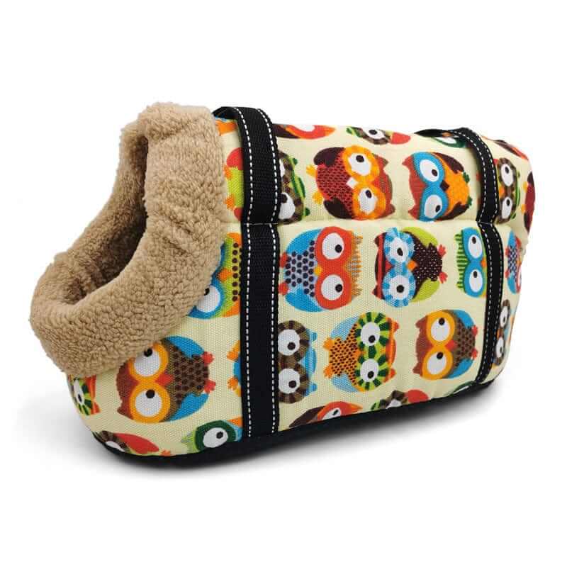 Pet Travel Shoulder Bag for dogs and cats featuring colorful owl design and cozy interior.