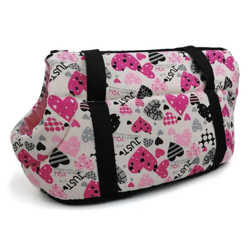 Pet Travel Shoulder Bag - breathable mesh carrier for dogs and cats, featuring pink heart design and comfortable shoulder straps.
