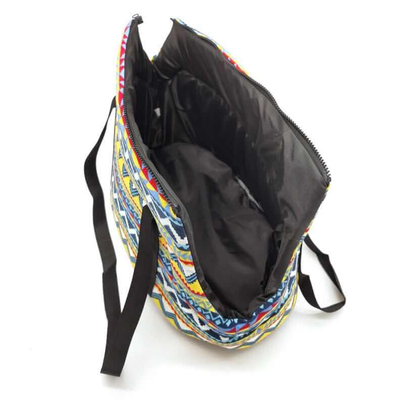 Inside view of the Pet Travel Shoulder Bag featuring colorful design, spacious interior, and adjustable straps for dogs and cats.