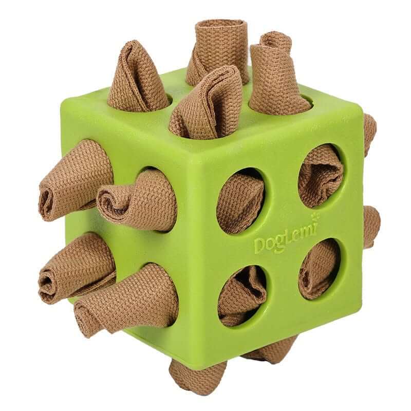 Portable Sniffing Cube - Interactive Dog Training Toy, a green toy with fabric hiding spots for dogs to forage treats.