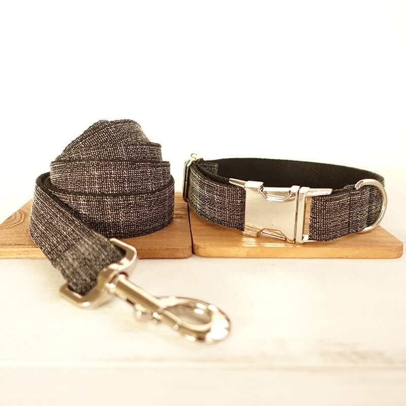 The Black Suit Dog Collar & Leash set showcasing elegant design with durable materials, perfect for stylish dog owners.