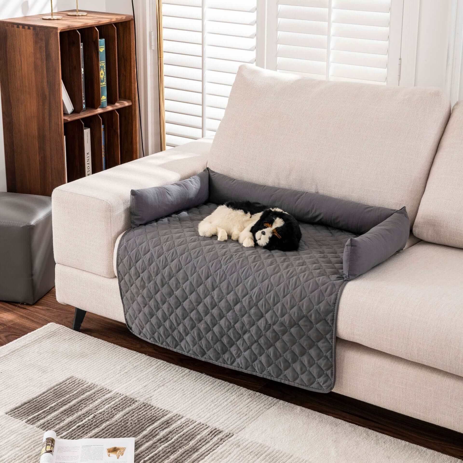 Waterproof Pet Bed Mat on a sofa, providing comfort for dogs and cats, featuring a cozy, quilted design to protect furniture.