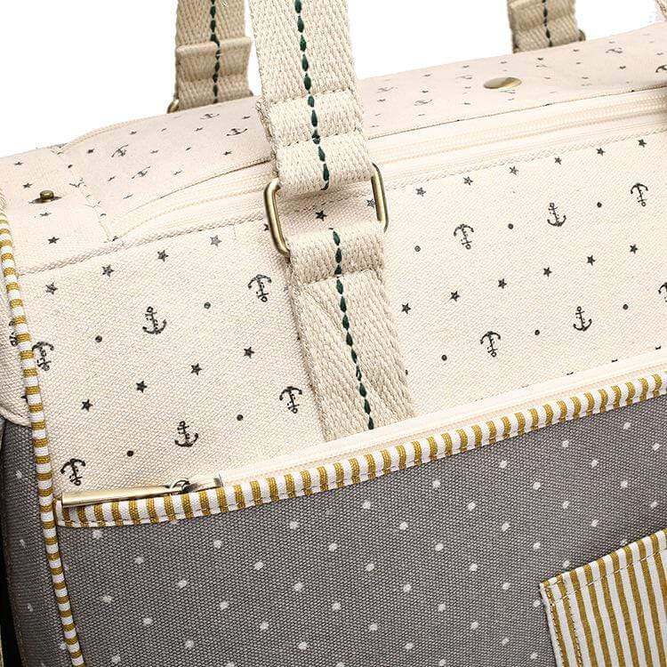 Anchor Pet Canvas Carrier Bag side view showcasing durable material, adjustable straps, and anchor pattern design for pets.