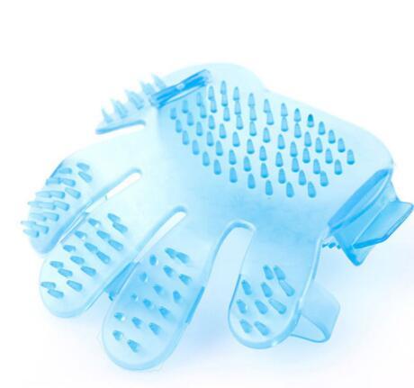 Deshedding Pet Brush glove in blue silicone, featuring five finger design for massaging and grooming dogs & cats.