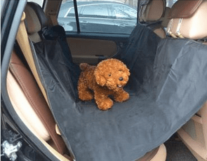 Durable Car Seat Covers for Dogs in a car, featuring protective anti-slip design and soft comfort for pets.