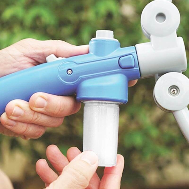 Foldable cleaning hose attachment showing the easy-to-use shampoo dispenser for dog grooming.