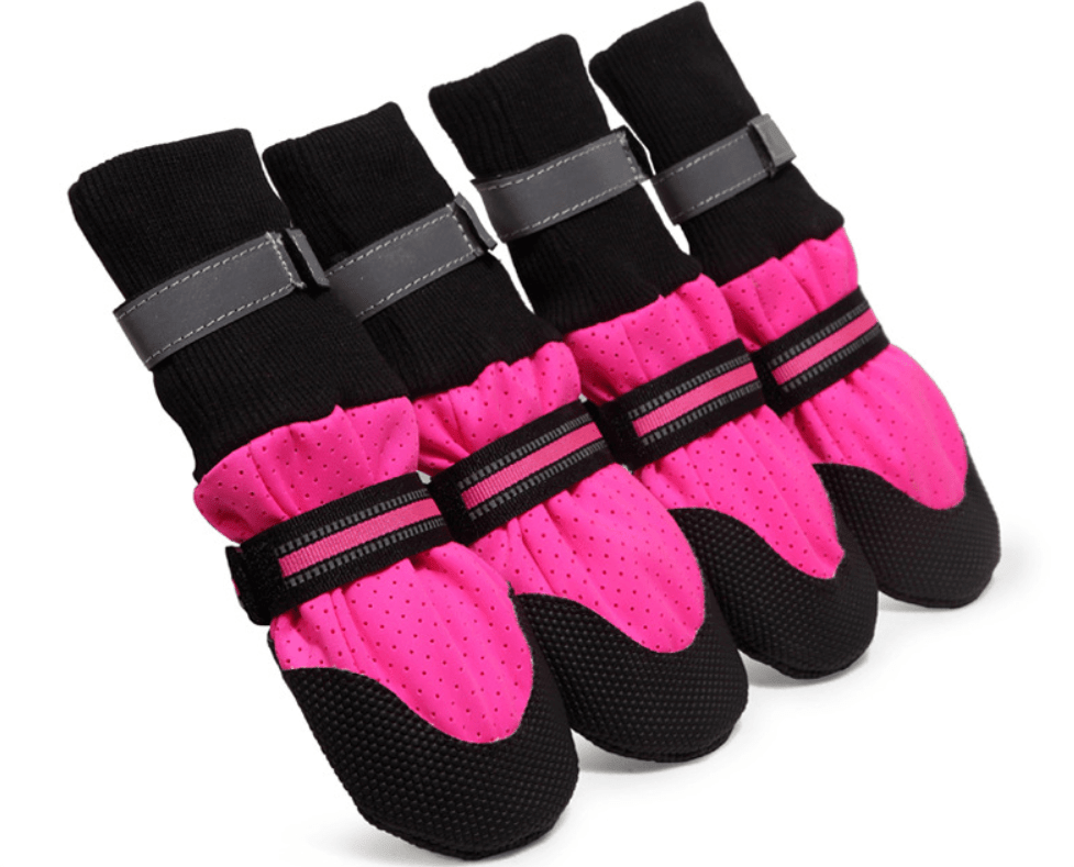 Pet Dog Shoes Anti-slip Snow Pet Boots in pink with sturdy soles, durable design for protection against icy surfaces.
