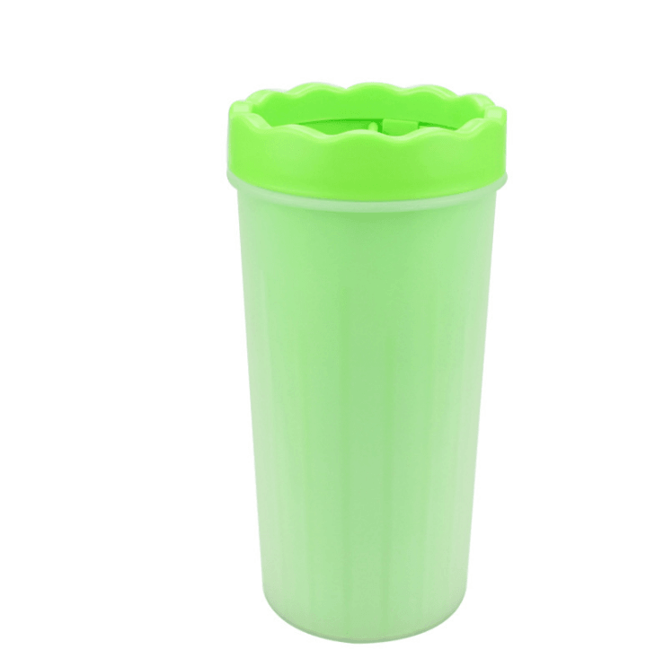 Silicone Dog Paw Washer Cup in green, a gentle cleaning tool for dogs with a soft brush and removable lid.