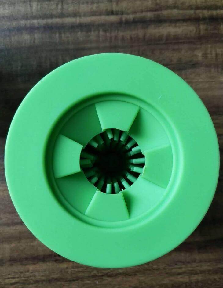 Silicone Dog Paw Washer Cup top view showing innovative cleaning brush and silicone lid features for dogs and cats.