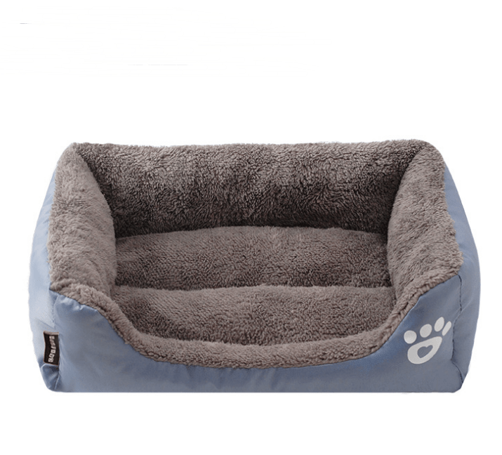 Super Soft Warm Pet Bed - Ultra-soft cat and dog bed with nest-like walls for comfort and security.