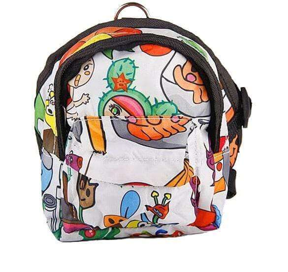 Unicorn Dog Backpack with colorful design, featuring expandable pocket and D-ring clip for dogs.